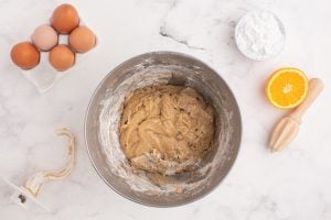 dough in floured bowl