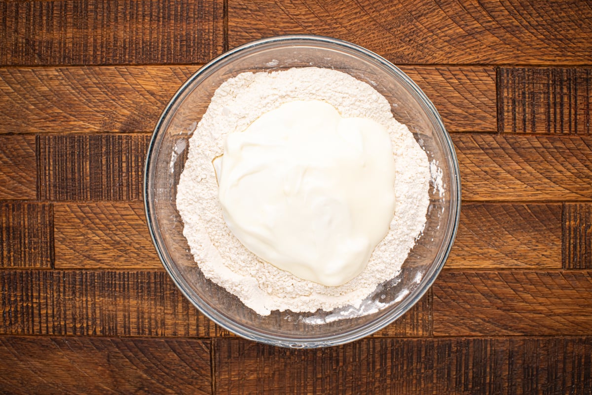 Greek yogurt and flour in a bowl