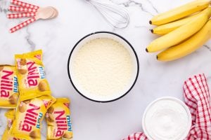 milk and banana pudding mixed in a bowl