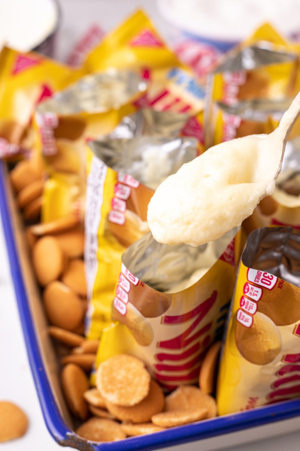 spooning pudding into bags