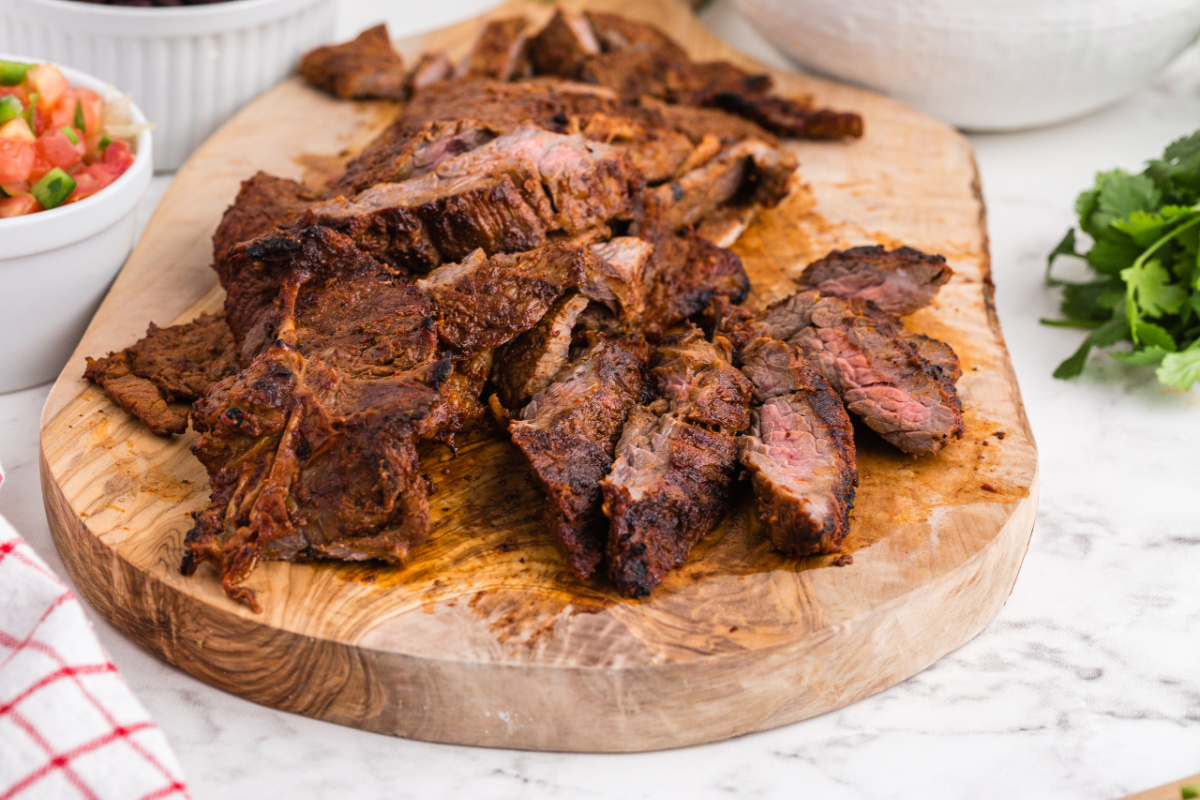 steak sliced on cutting board
