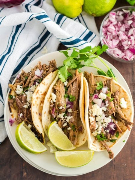 Slow Cooker Barbacoa Beef Tacos on a plate