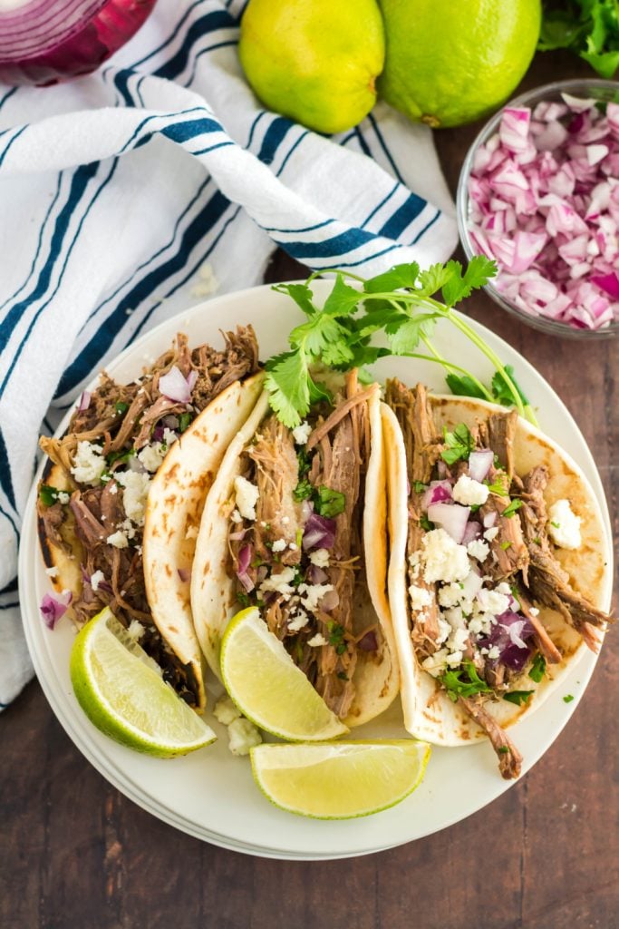 Slow Cooker Barbacoa Beef Tacos on a plate