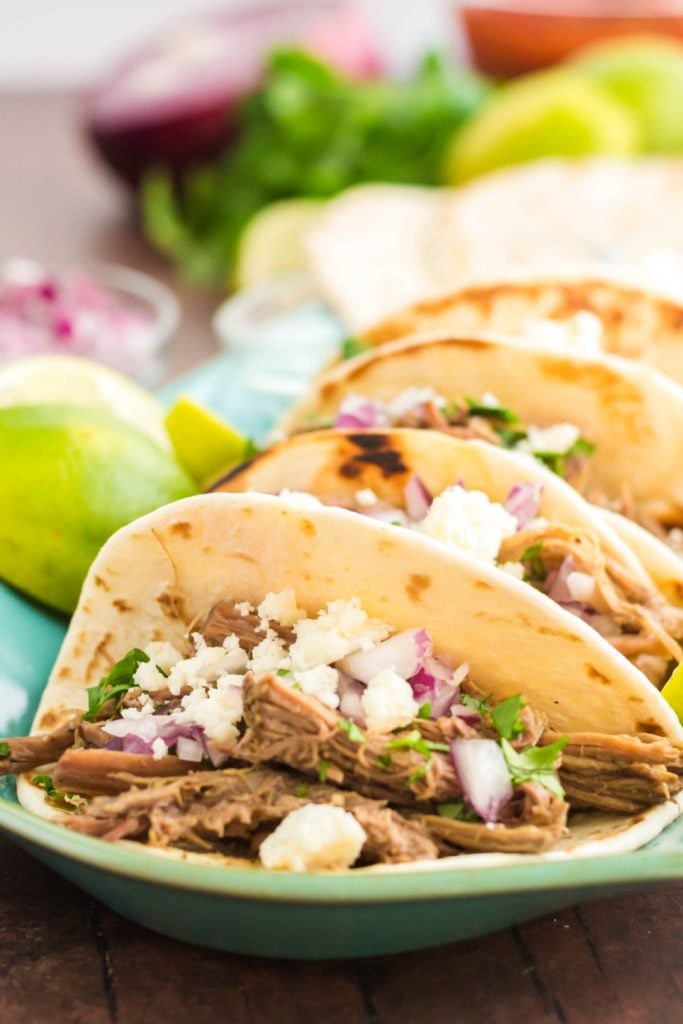 Slow Cooker Barbacoa Beef Tacos on a plate