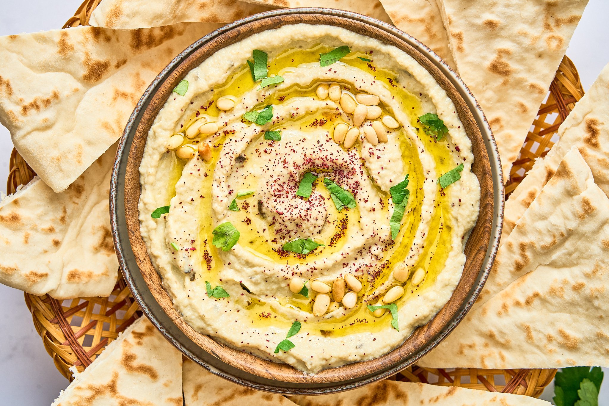 Air Fryer Baba Ganoush in a bowl with pita bread pieces