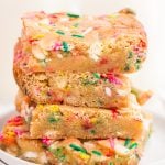 Birthday Cake Blondies stacked on a plate
