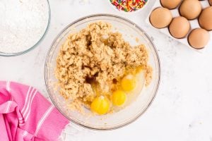 eggs and vanilla added to bowl