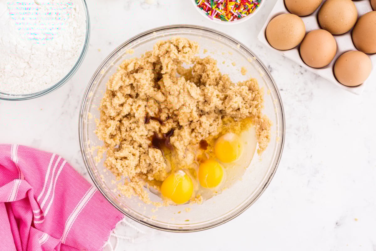 Add eggs and herbs to the bowl