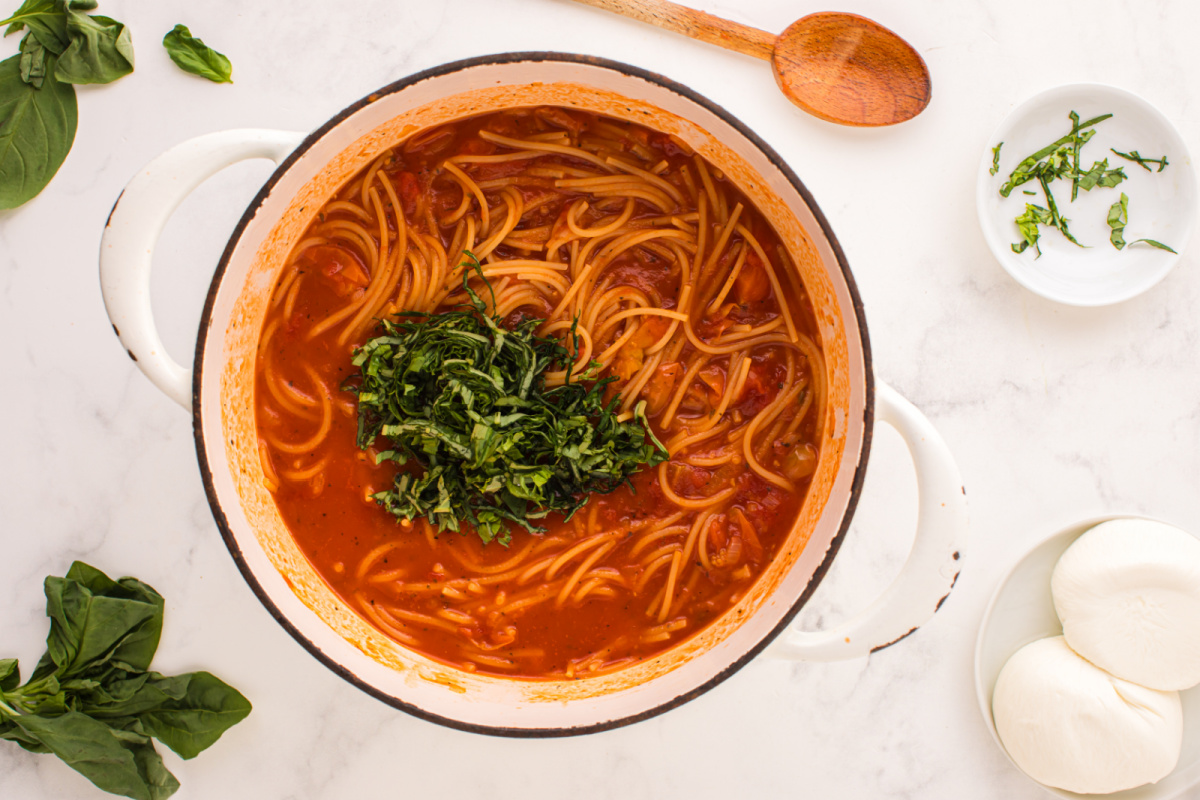 Add basil to the pot
