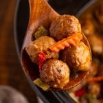 Slow Cooker Chicago Style Meatballs on a wooden spoon