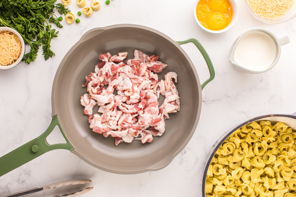 Uncooked bacon in the pot