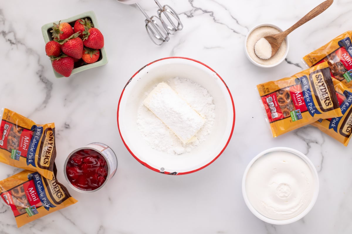 Cream cheese and sugar in a bowl