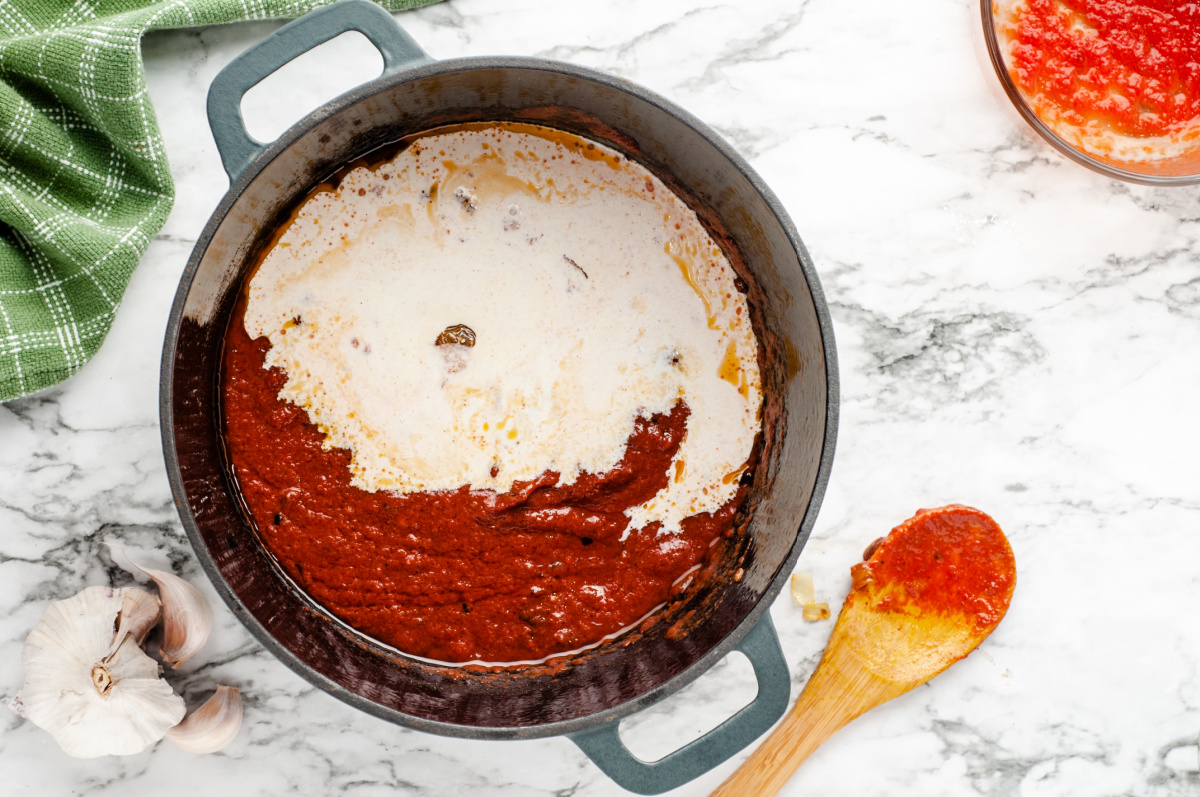 Add tomatoes and cream to the pan