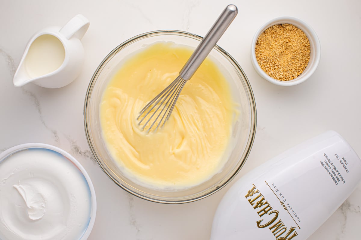 Milk, Rumchata and pudding mixture, mix in bowl