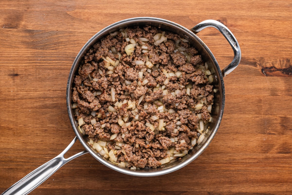 Add diced onions to brown beef