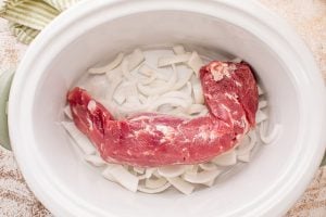 pork added to slow cooker