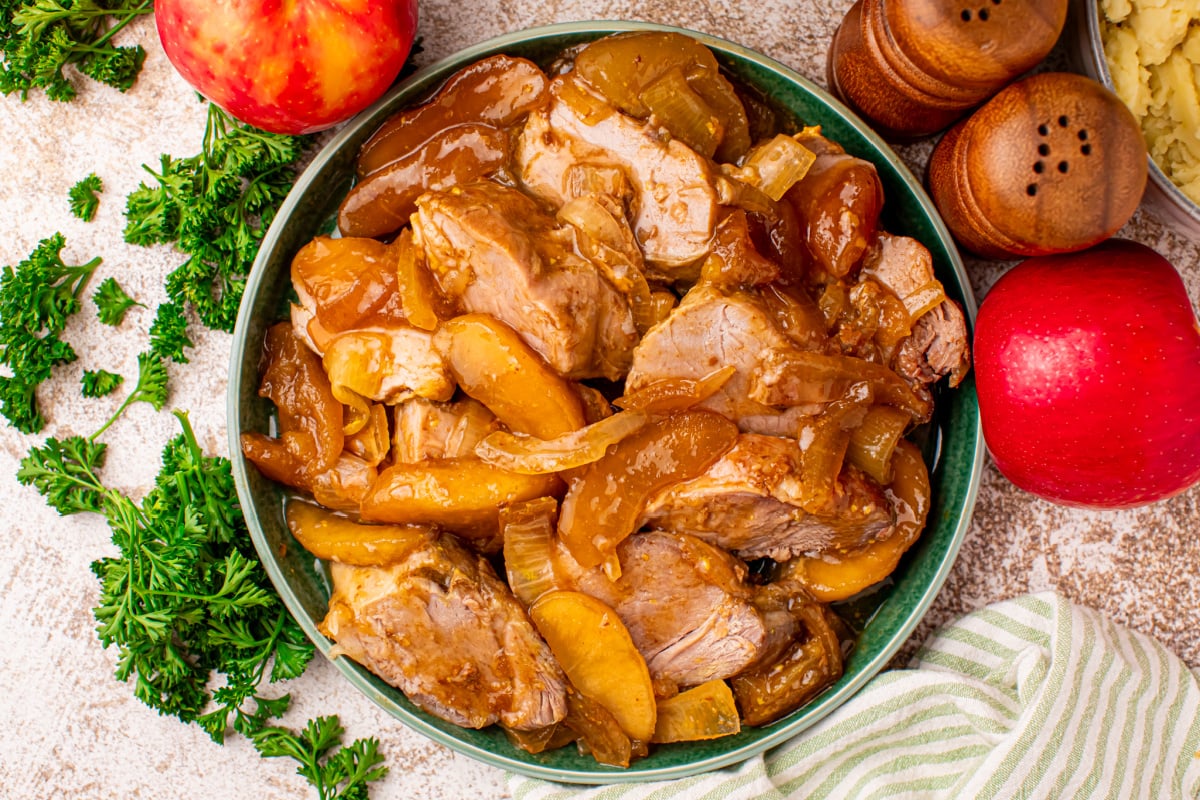 Slow-cooked apple pie pork tenderloin on a plate
