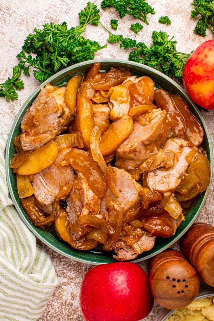 Slow-cooked apple pie pork tenderloin on a plate