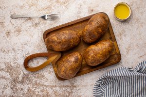 potatoes on cutting board