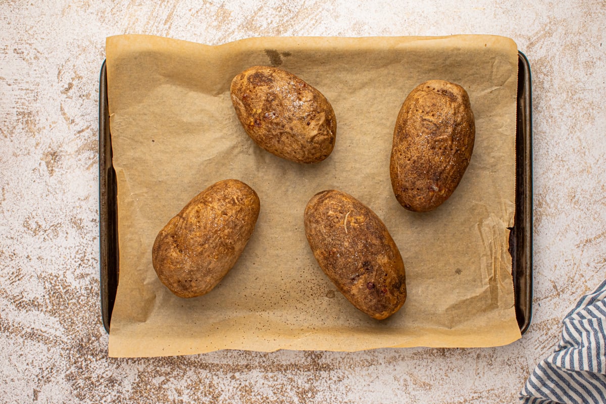Bake potatoes on a baking tray
