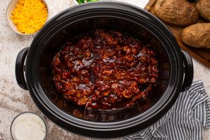 shredded bbq chicken in a slow cooker