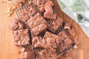 Snickers Brownies on a wire rack