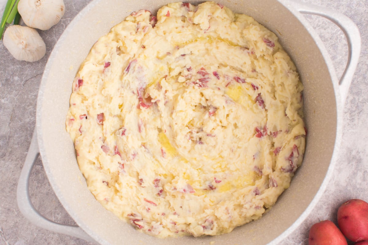 Steakhouse style garlic mashed potatoes in cooking pot