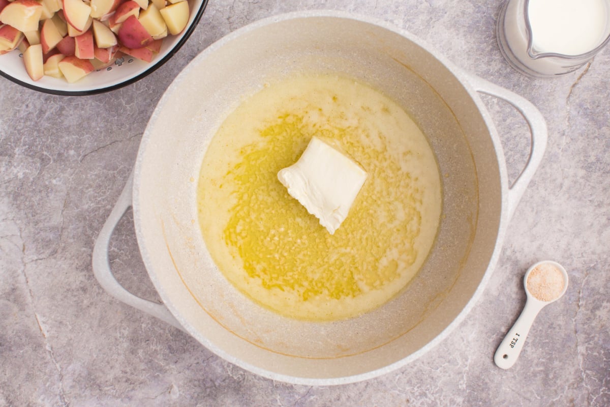 Melted butter, garlic and cream cheese in a pan