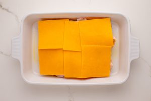 cheese sliced add on top of chicken slices