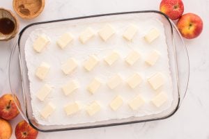 butter tabs placed on top of cake mix