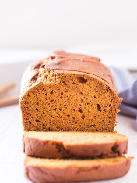 Classic Pumpkin Bread sliced on a cutting board
