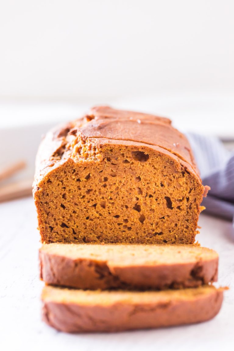 Classic Pumpkin Bread sliced on a cutting board