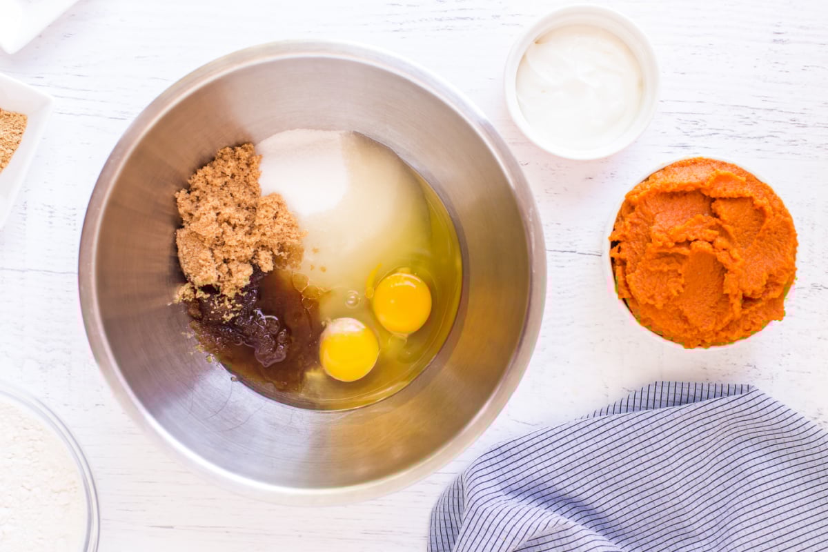 Place eggs, both sugars (brown and granulated) and vanilla extract in a mixing bowl