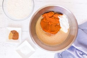pumpkin puree and sour cream added to mixture