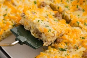 cooked casserole cut into pieces in baking dish