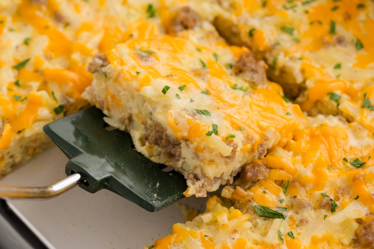 Cut the cooked casserole into pieces and place in a baking dish