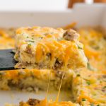 Hashbrown Breakfast Casserole being scooped up with spatula