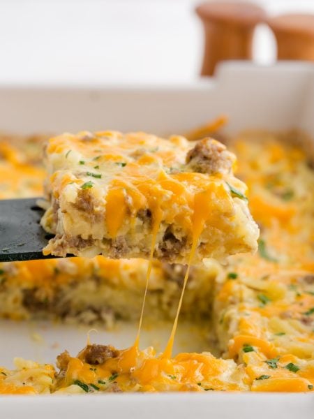 Hashbrown Breakfast Casserole being scooped up with spatula