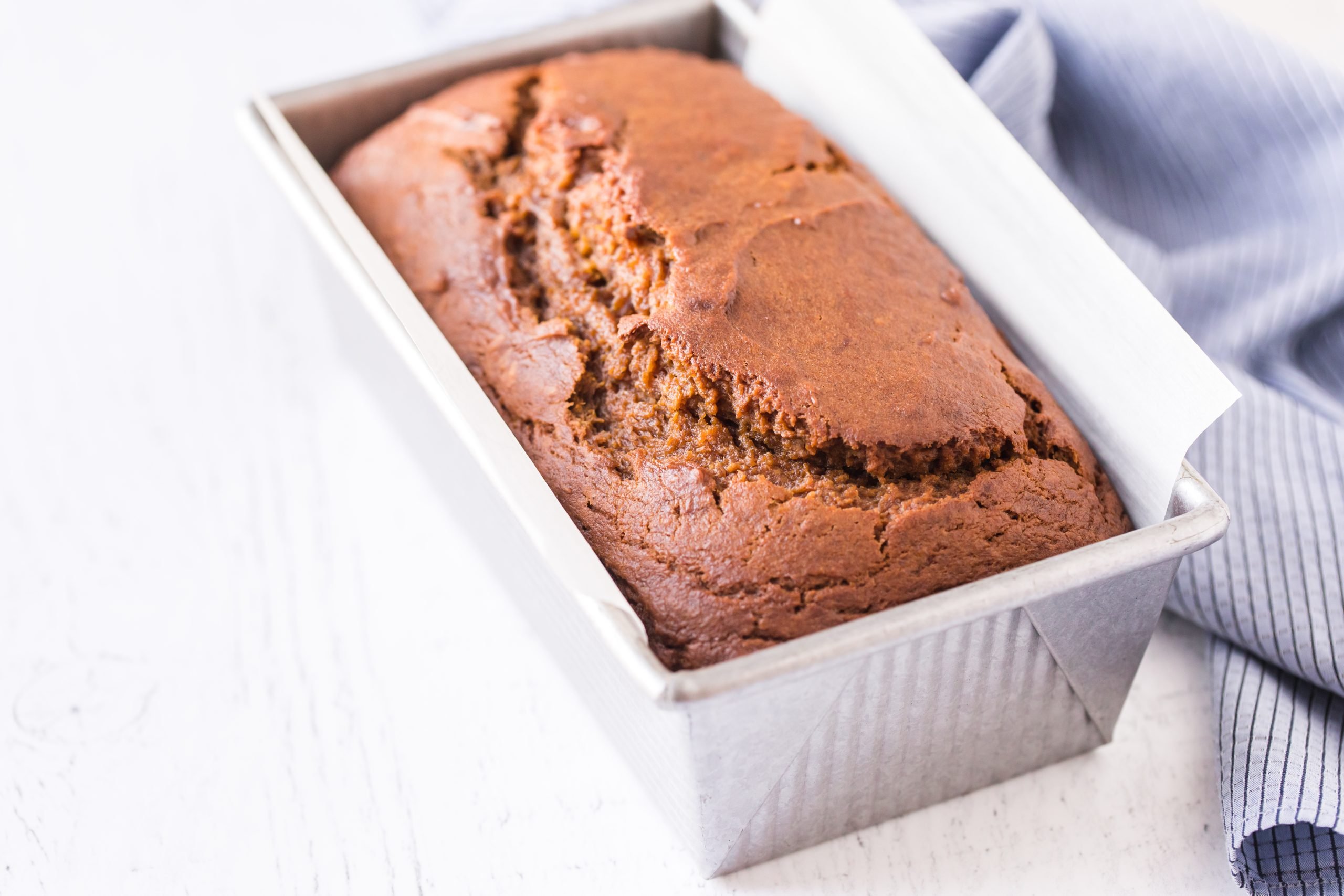 Classic pumpkin bread in a baking pan