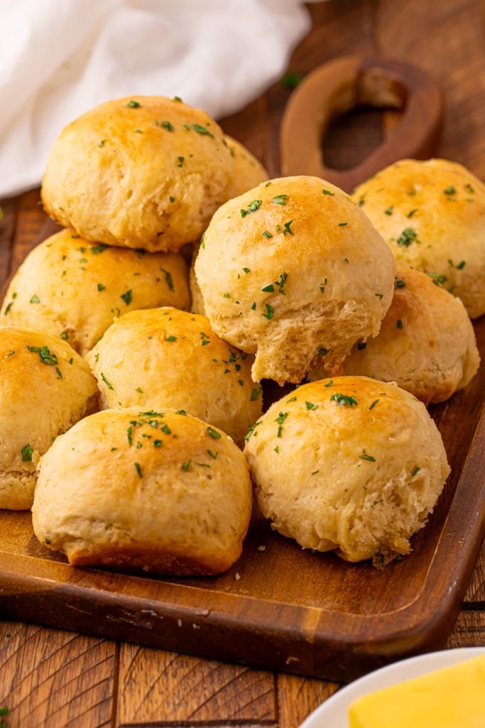 Sour Cream Dinner Rolls on a cutting board