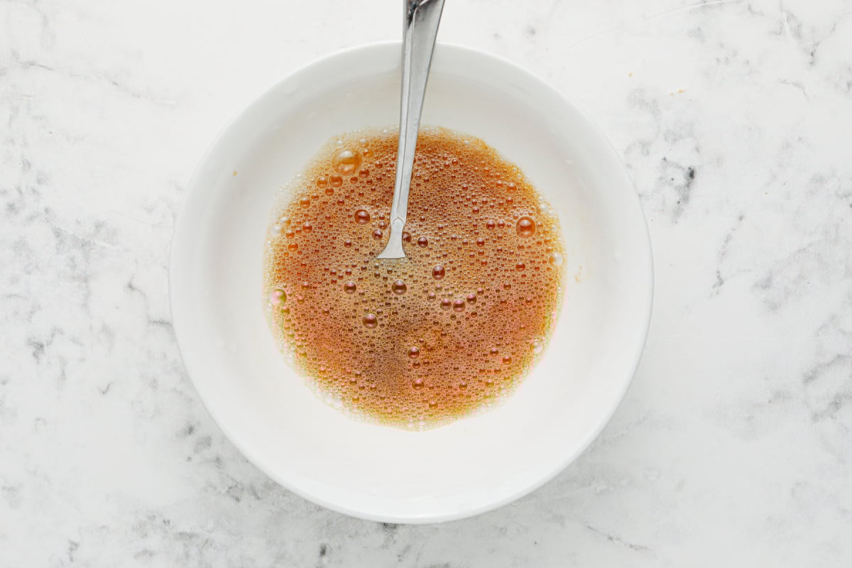 vanilla and egg whites mixed in a bowl