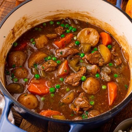 Apple Cider Beef Stew in a dutch oven