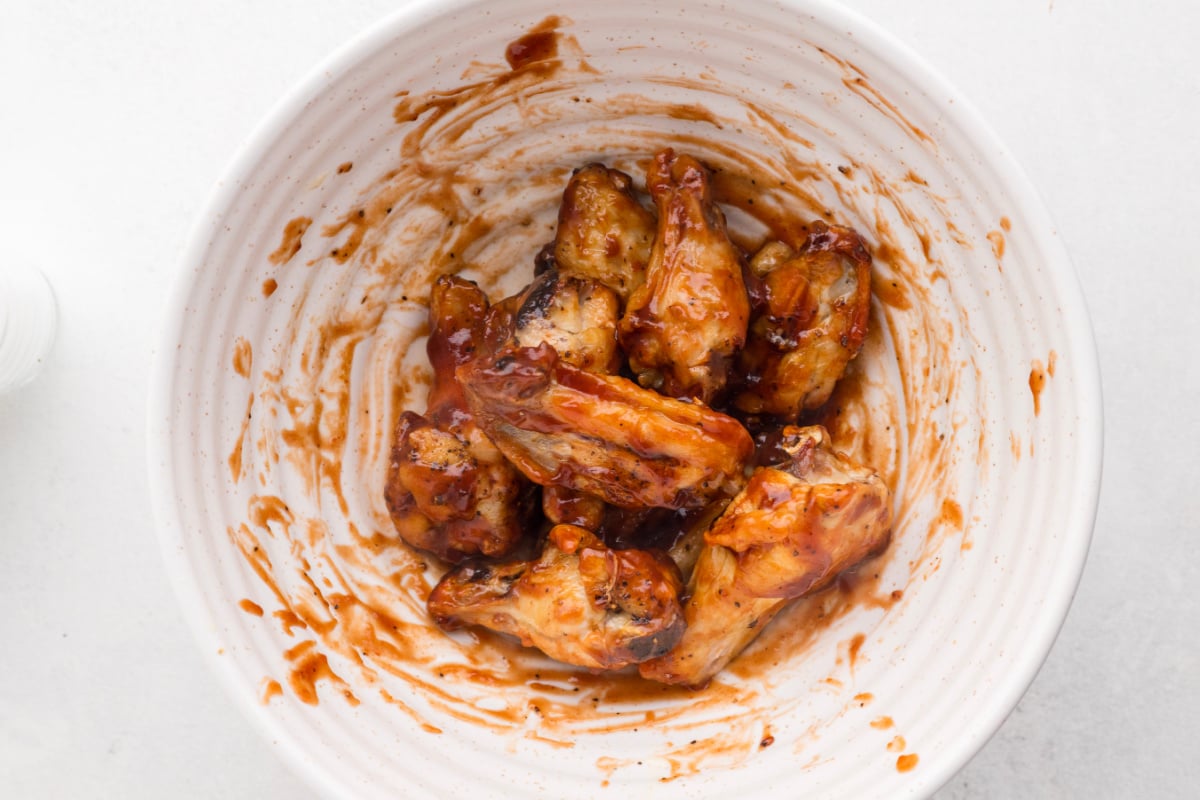 Chicken wings tossed in BBQ sauce