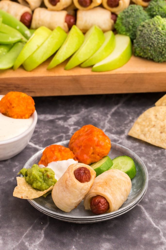 There are some super bowl football appetizer boards on the plate