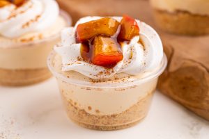 Apple Pie Cheesecake Pudding Shots on a table