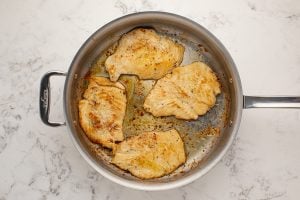 seasoned chicken in a pan