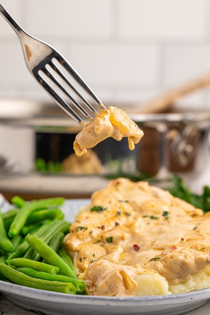 Creamy Boursin Chicken Skillet Place on Plate with Fork
