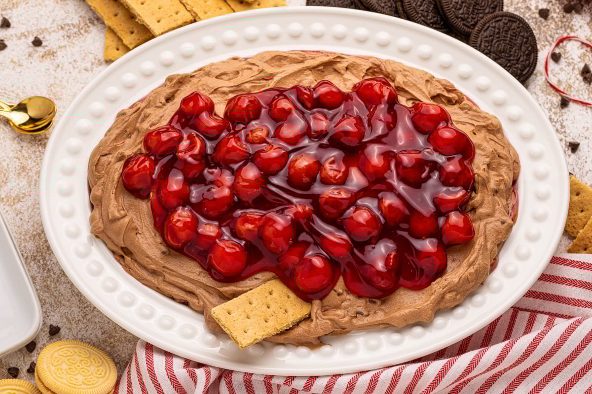 Cherry chocolate cheesecake dip on plate