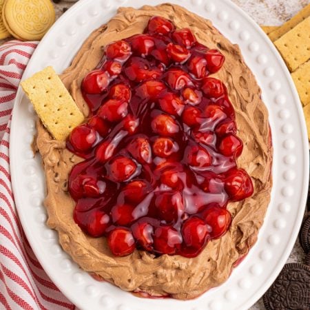 cherry chocolate cheesecake dip on a plater