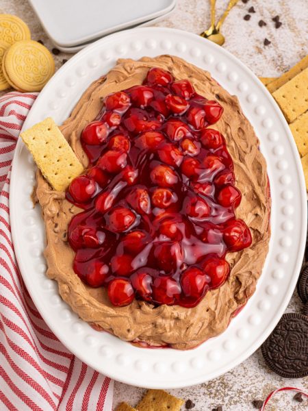 cherry chocolate cheesecake dip on a plater